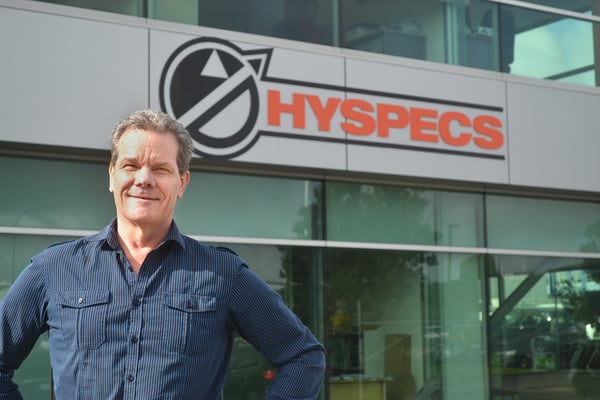 Richard in front of Hyspecs Sign - Raw